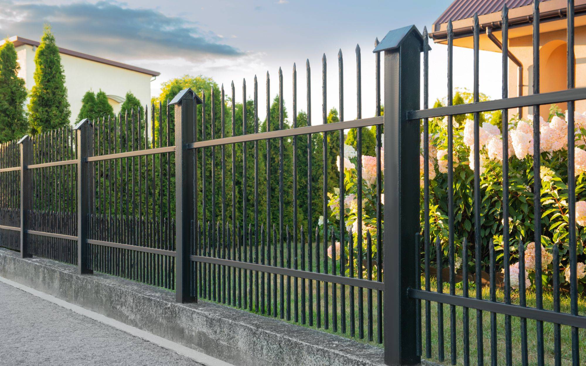 Beautiful Black Iron Fence Near Pathway Outdoors